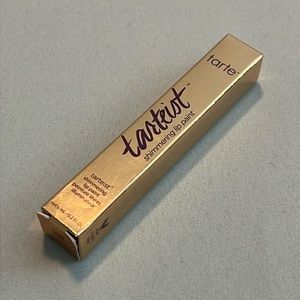 Tarte shimmering lip paint in Strike Gold